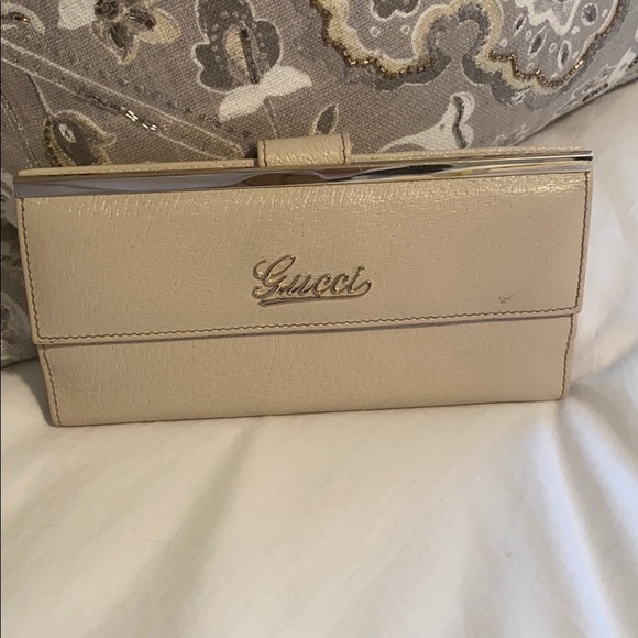 Gucci Handbags - Cream colored Gucci long wallet